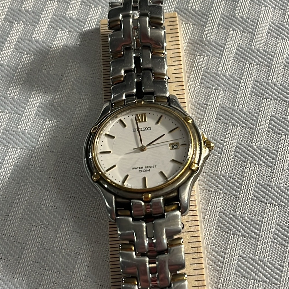 Seiko Water Resistance Gold tone & Stainless Steel with Date Men’s Watch.